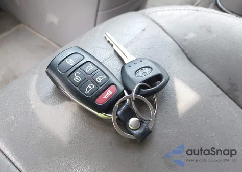 2007 Hyundai Entourage Gls/Limited/Se z USA, uszkodzony, nr VIN KNDMC233376038632